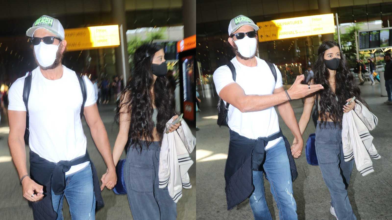 Hrithik Roshan and Saba Azad exit Mumbai airport hand in hand; netizens correct paparazzo who calls her his 'rumored girlfriend'