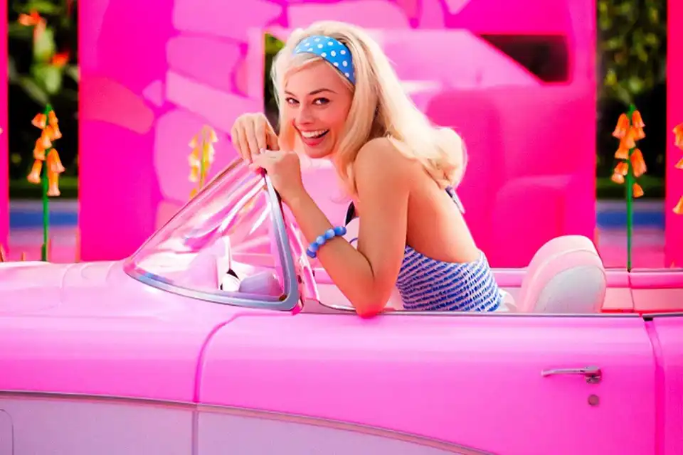 Barbie movie new BTS pics give us a look at Margot Robbie in 70s Pink Bellbottom Costume