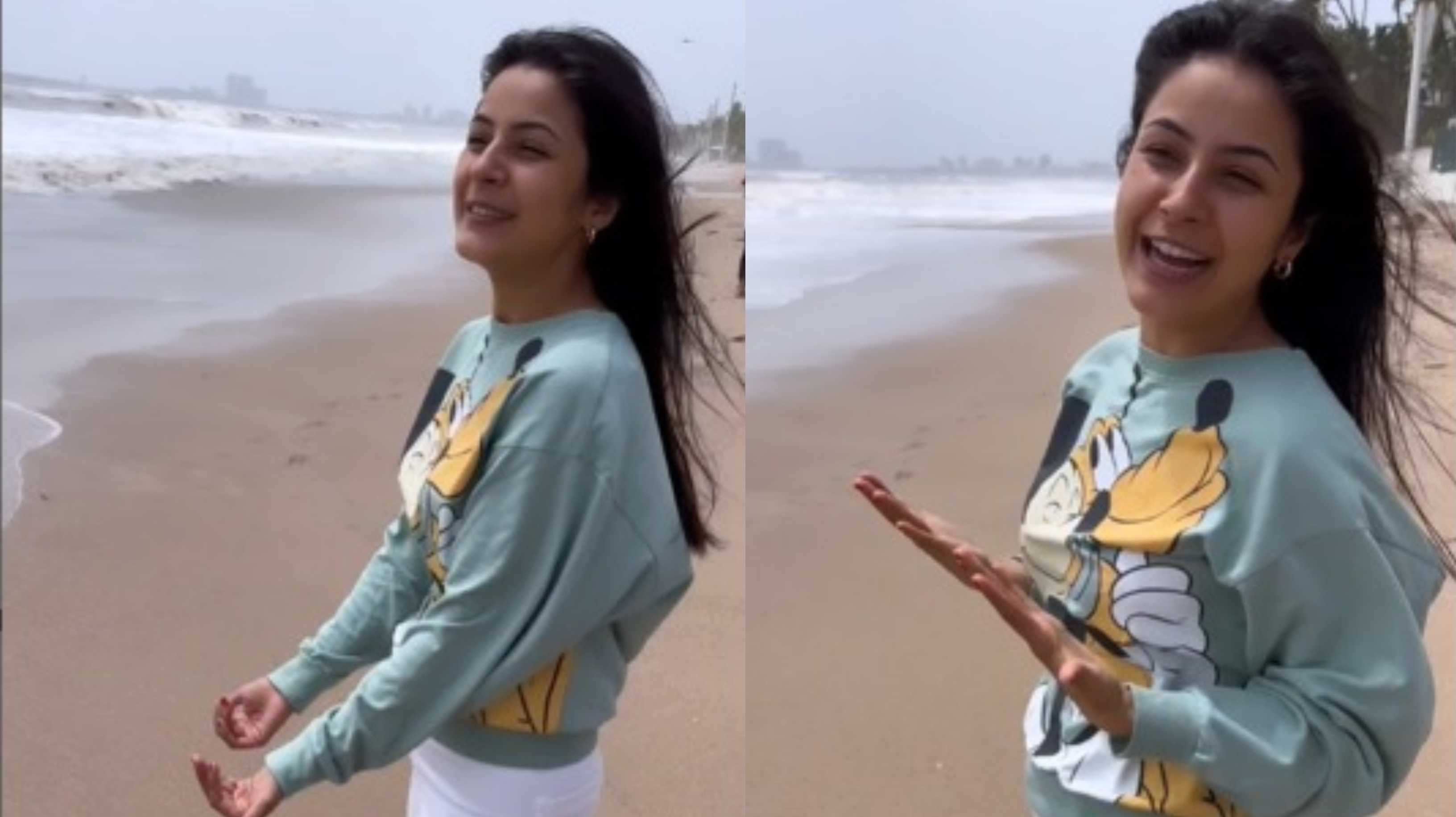 Shehnaaz Gill enjoys her day at the beach; greets the waves in a cute video by saying ‘come baby’