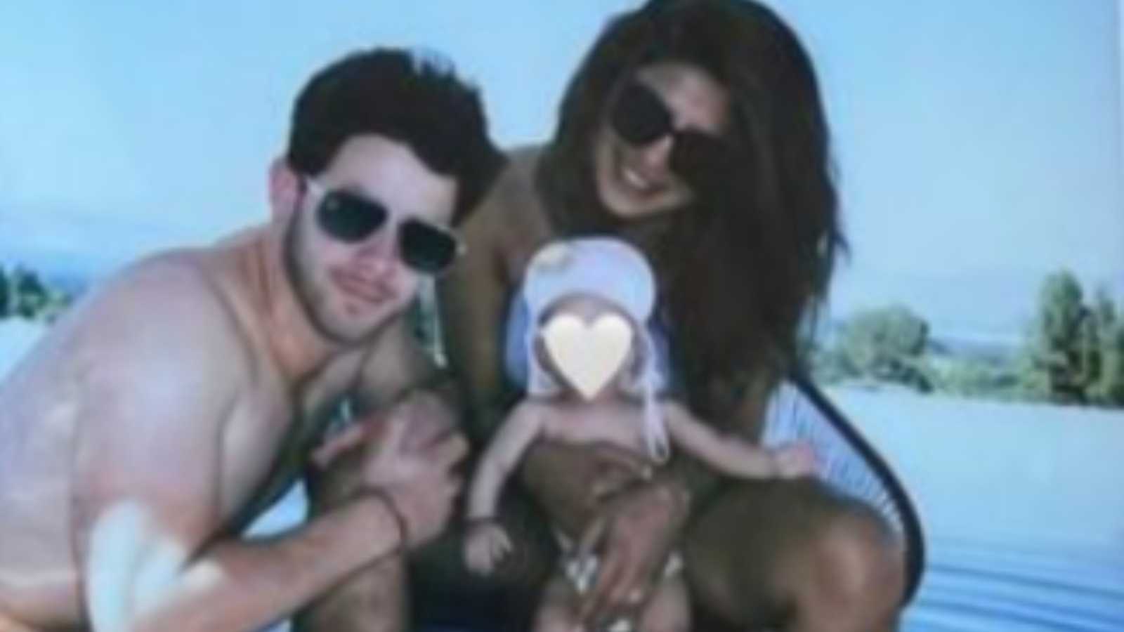 Priyanka Chopra and Nick Jonas strike a pose with their little munchkin Malti Marie by the poolside, see pic