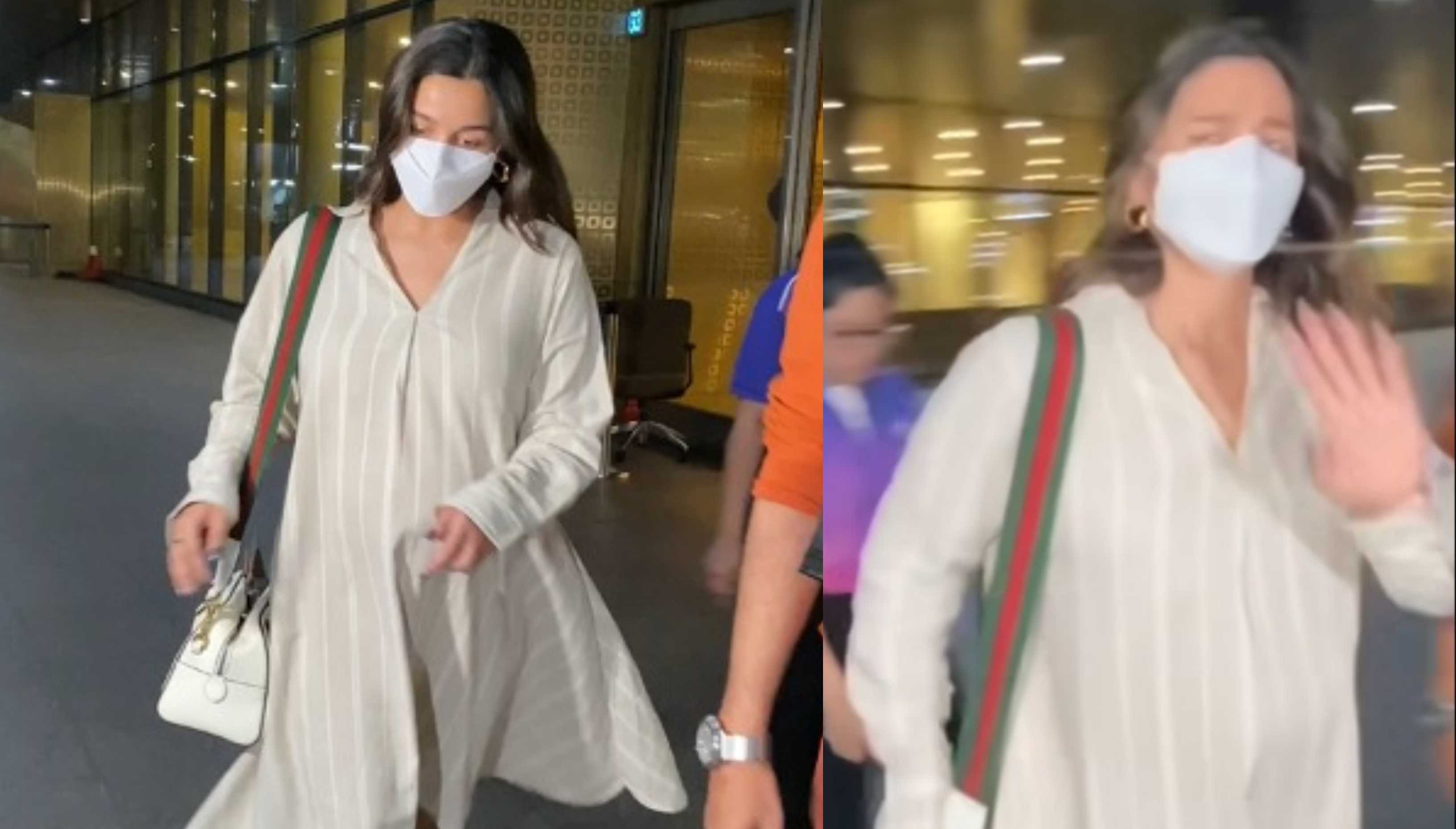 Alia Bhatt looks comfy yet chic in a midi from her maternity wear line at the airport; refuses to pose for paps