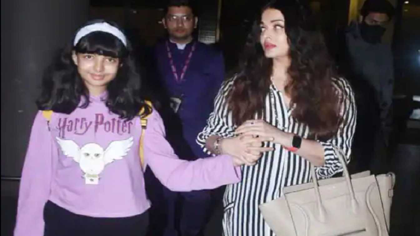 'Can't she allow the girl to be herself?': Aishwarya mercilessly trolled as she continues to hold daughter Aaradhya's hand at airport