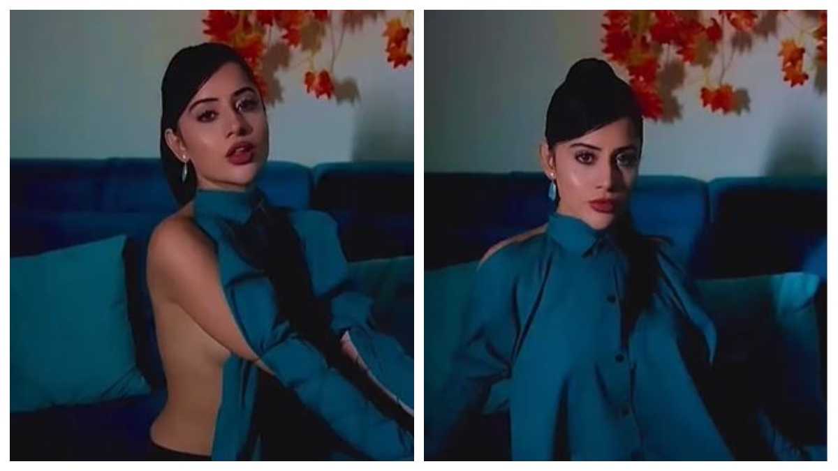 'Isko India se ban karwao koi' : Netizens again troll Urfi Javed as she confuses them by wearing a shirt only on one side of her body