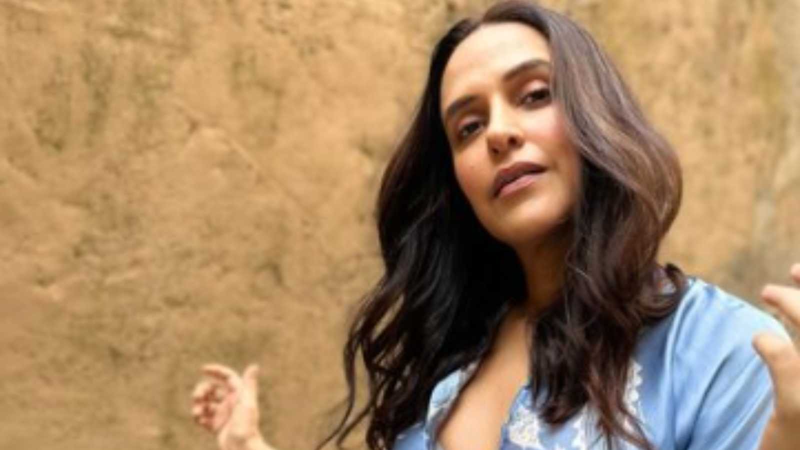 'Going naked has nothing to do with guts' : Neha Dhupia trolled for going semi-nude in her latest photoshoot