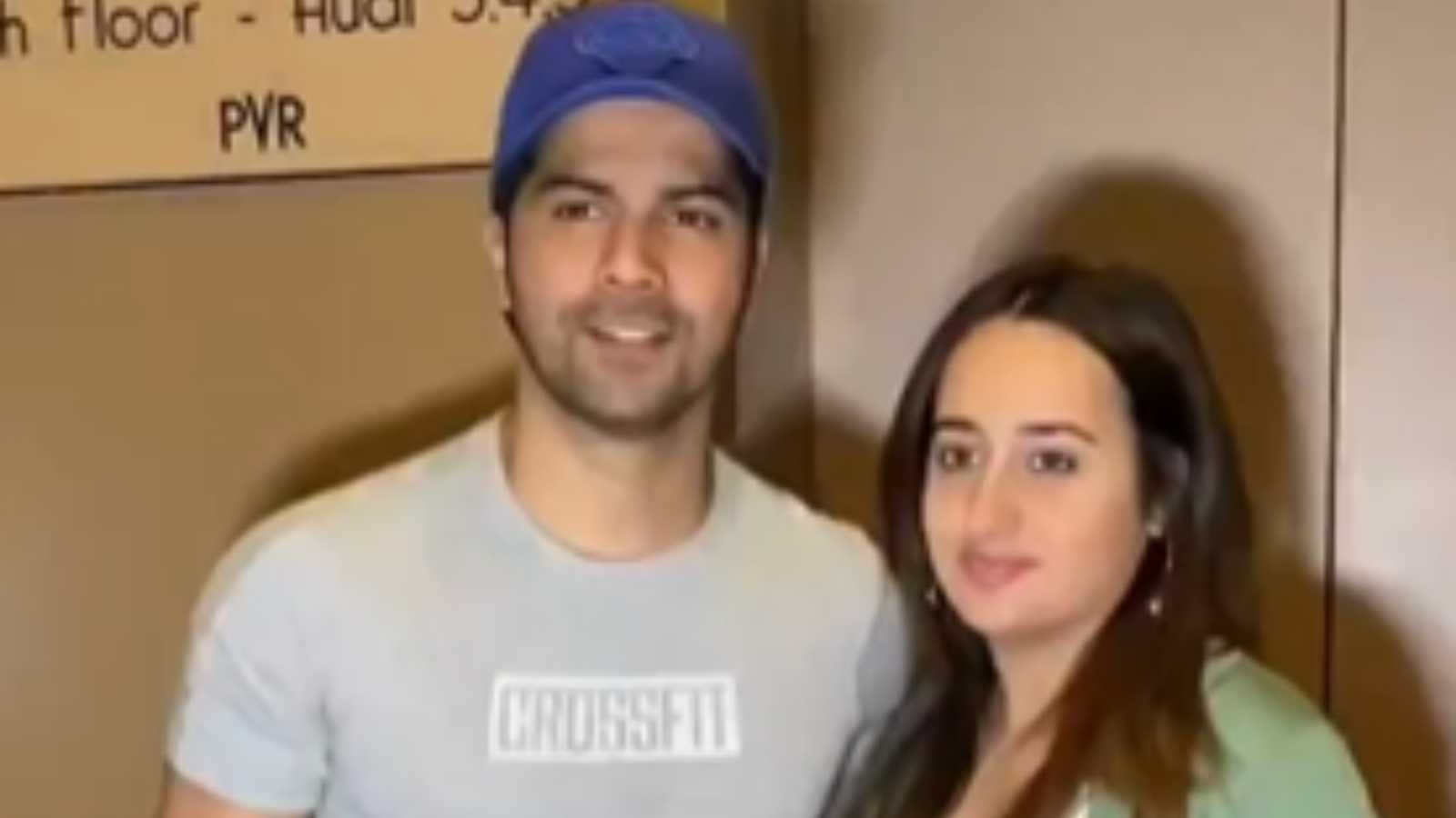 Varun Dhawan plays the doting hubby to Natasha Dalal during their movie date but fans are curious about her pregnancy