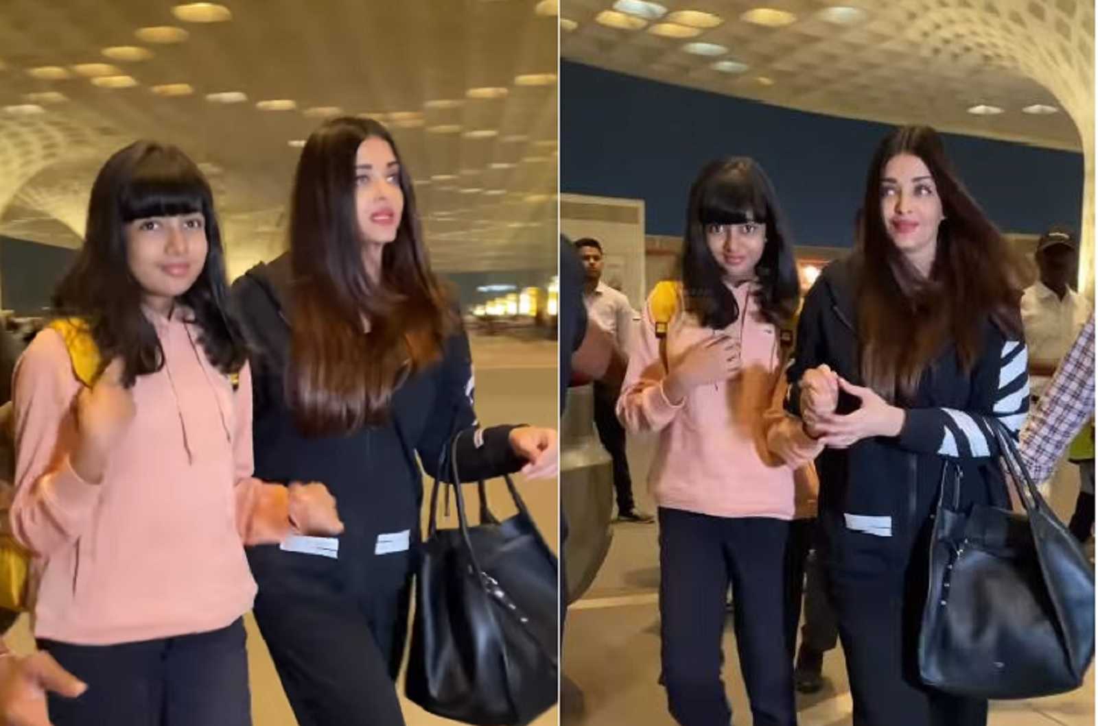 'Can't walk by herself soo low confident kid': Aishwarya Rai keeps daughter Aaradhya Bachchan close as paparazzi trail them at the airport