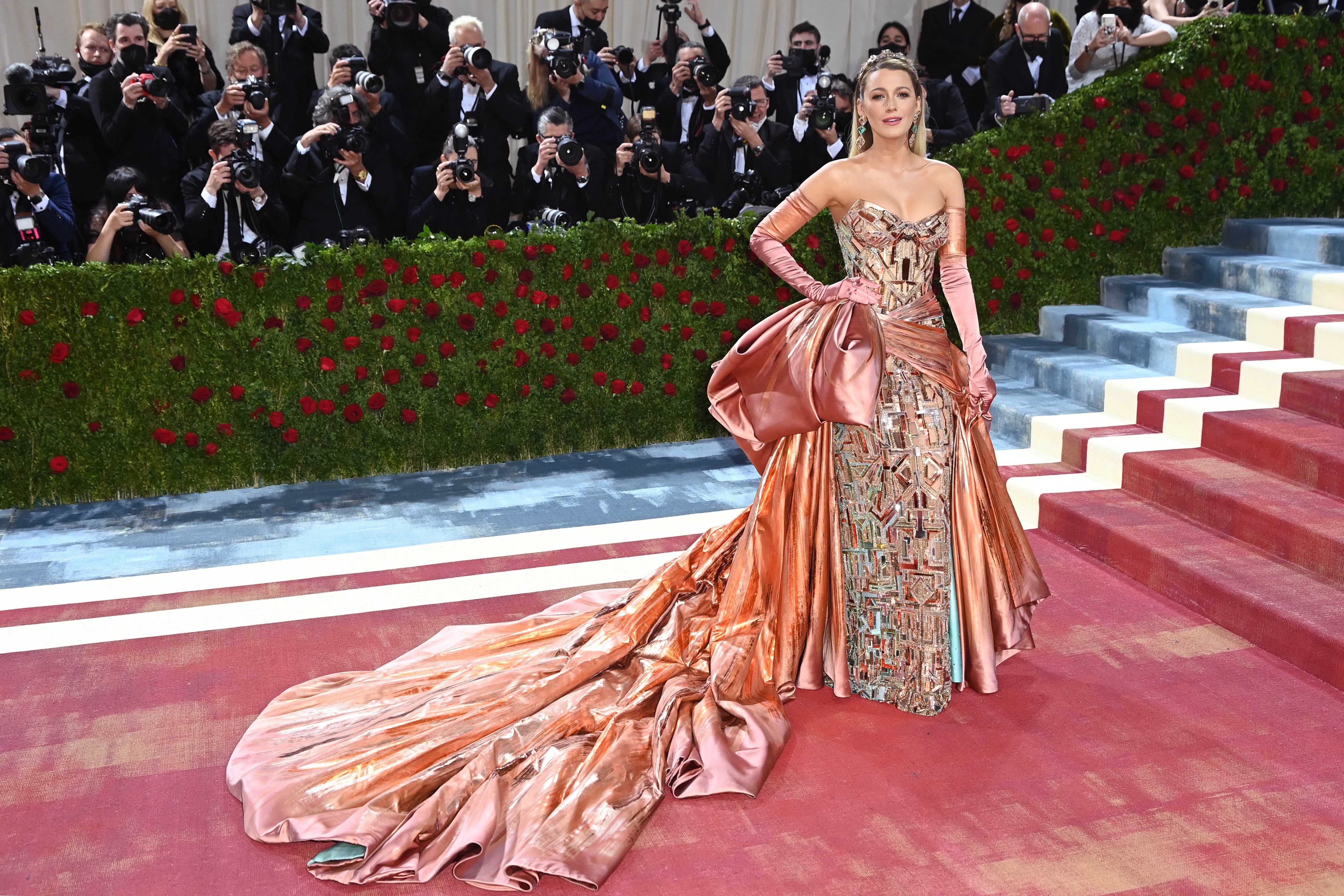 Blake Lively Fixes Her Met Gala Dress on Display at Kensington Palace