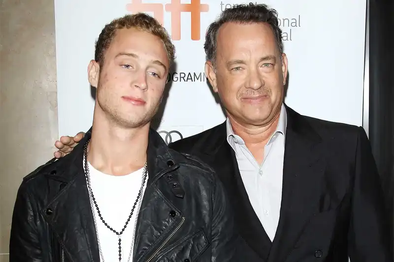 <p>Chet Hanks and Tom Hanks (Source: Entertainment Weekly)</p>