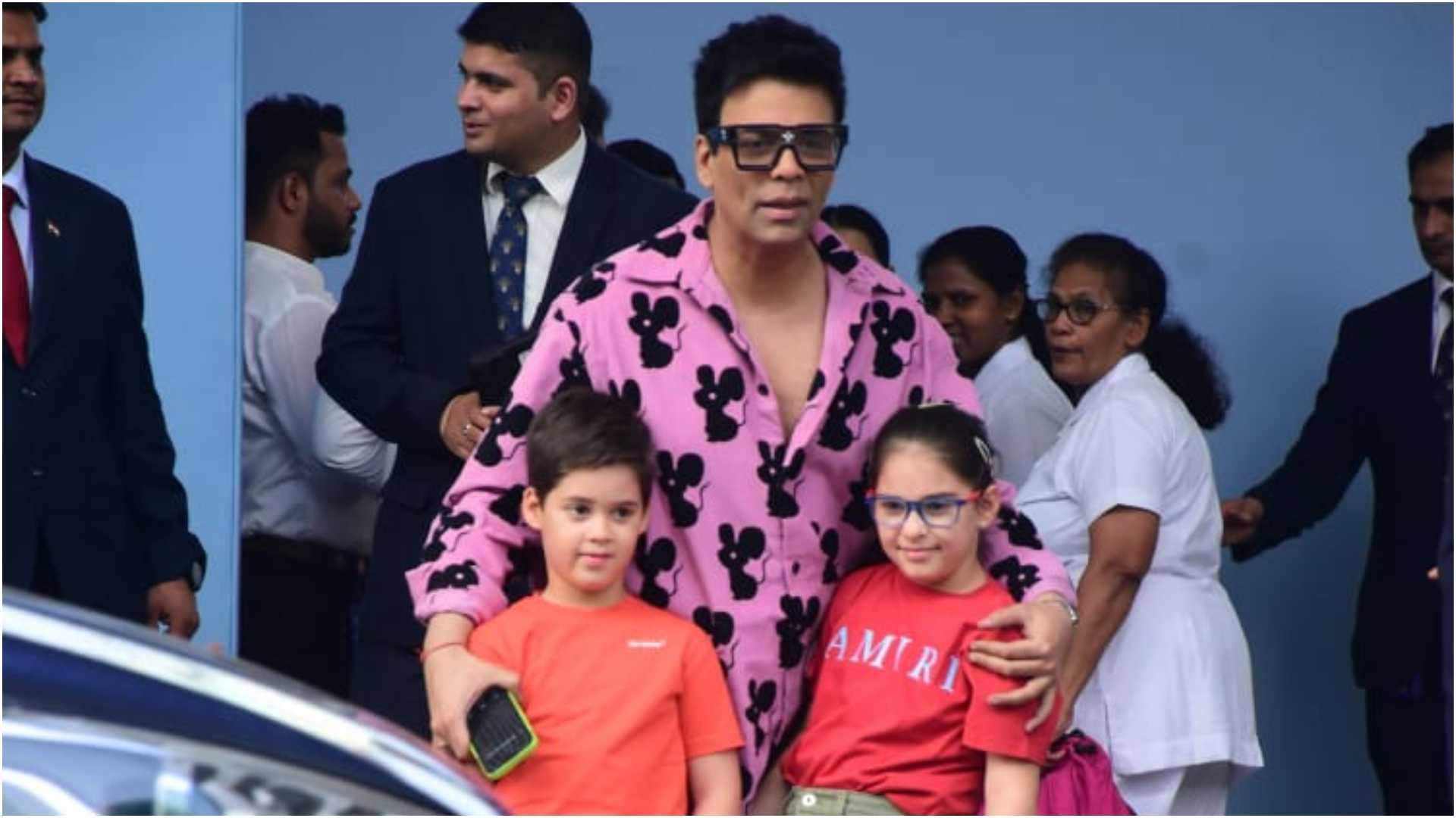 Pics: Karan Johar attends Isha Ambani's children's birthday bash with his twins Yash and Roohi in statement outfits