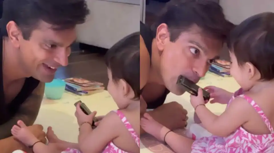 Bipasha Basu’s daughter Devi squeals with delight as her daddy Karan Singh Grover plays the harmonica; watch