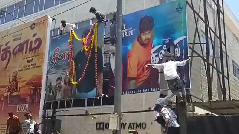 Fans celebrate Dheena re-release.