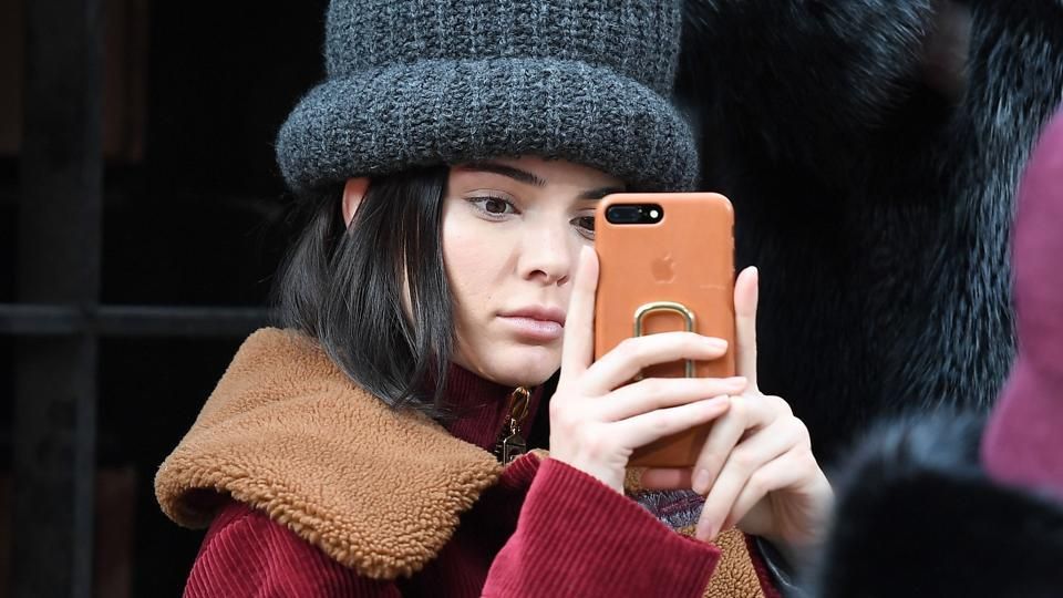 Kendall Jenner hides face as she returns to LA after Pepsi ad fiasco