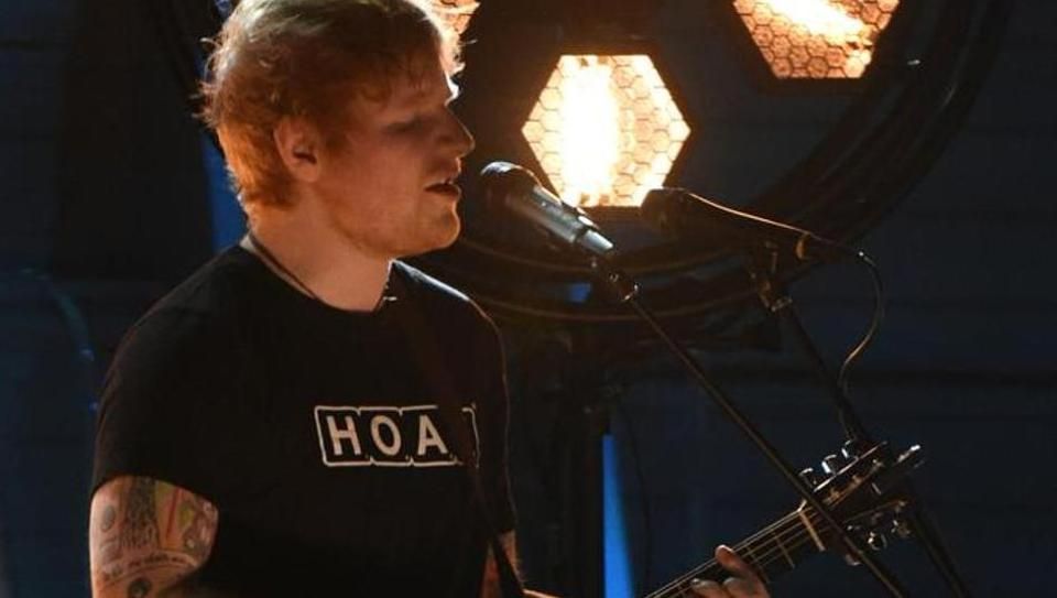 Ed Sheeran forgets lyrics during live performance, covers up with a nervous lau...