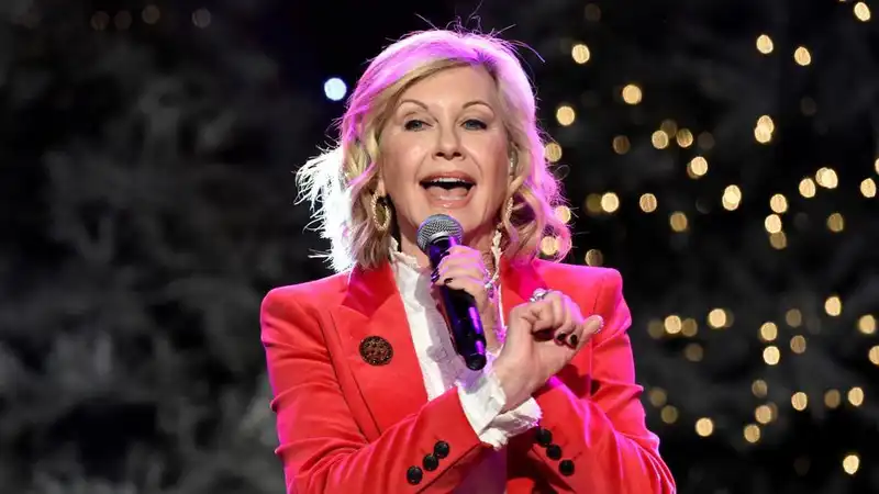 Singer Olivia Newton-John diagnosed with breast cancer again, postpones tour