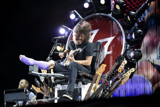 Dave Grohl Performs with Broken Leg
